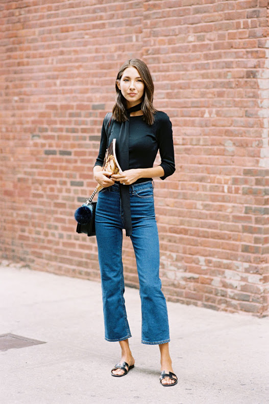 Black Top tucked into a flare jeans with sandals. (Source: Vanessa Jackman's Blog)